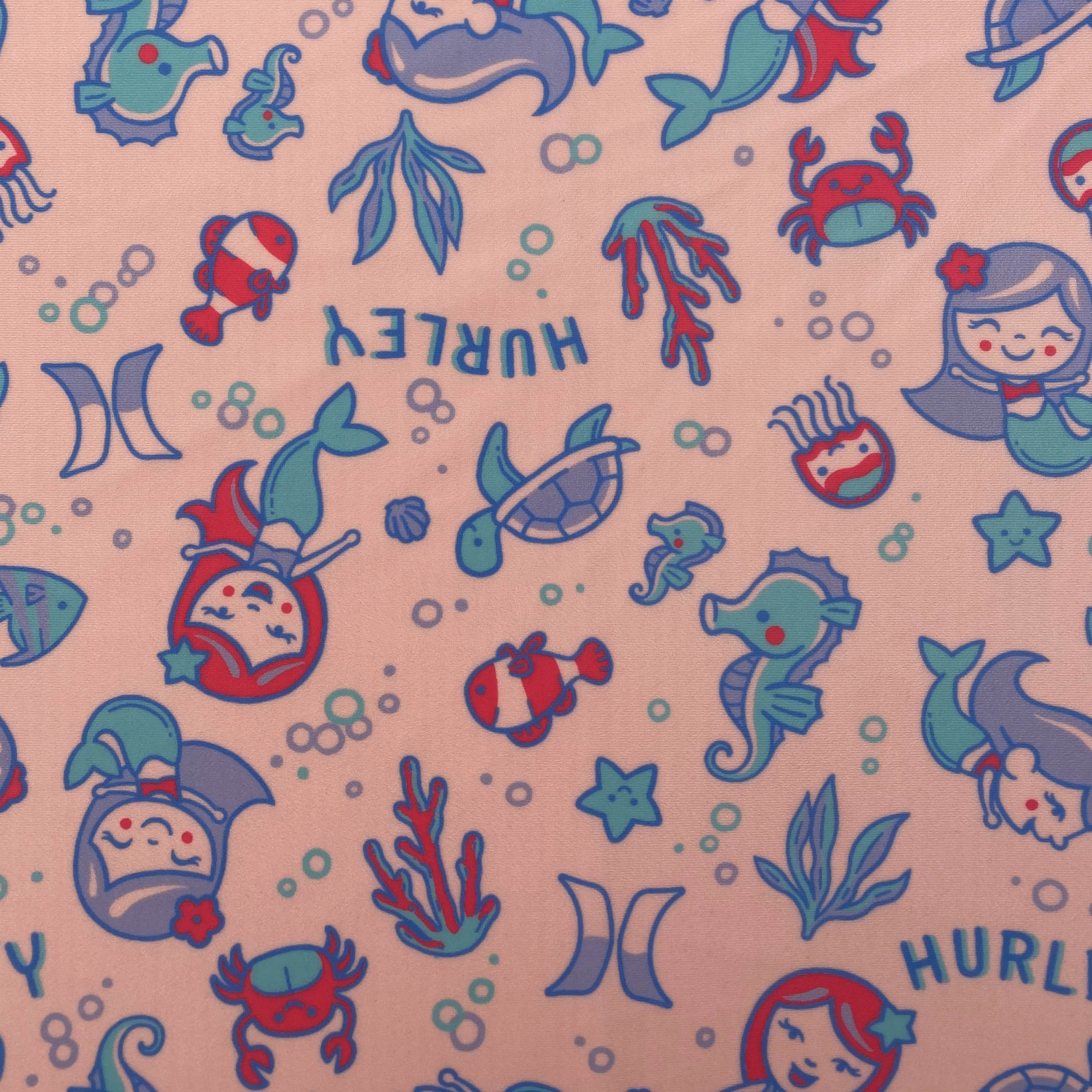 MGA MERMAIDS AT MARINE LIVES NA NA-PRINTED SA MAY PINK NA BACKGROUND POLYESTER FABRIC