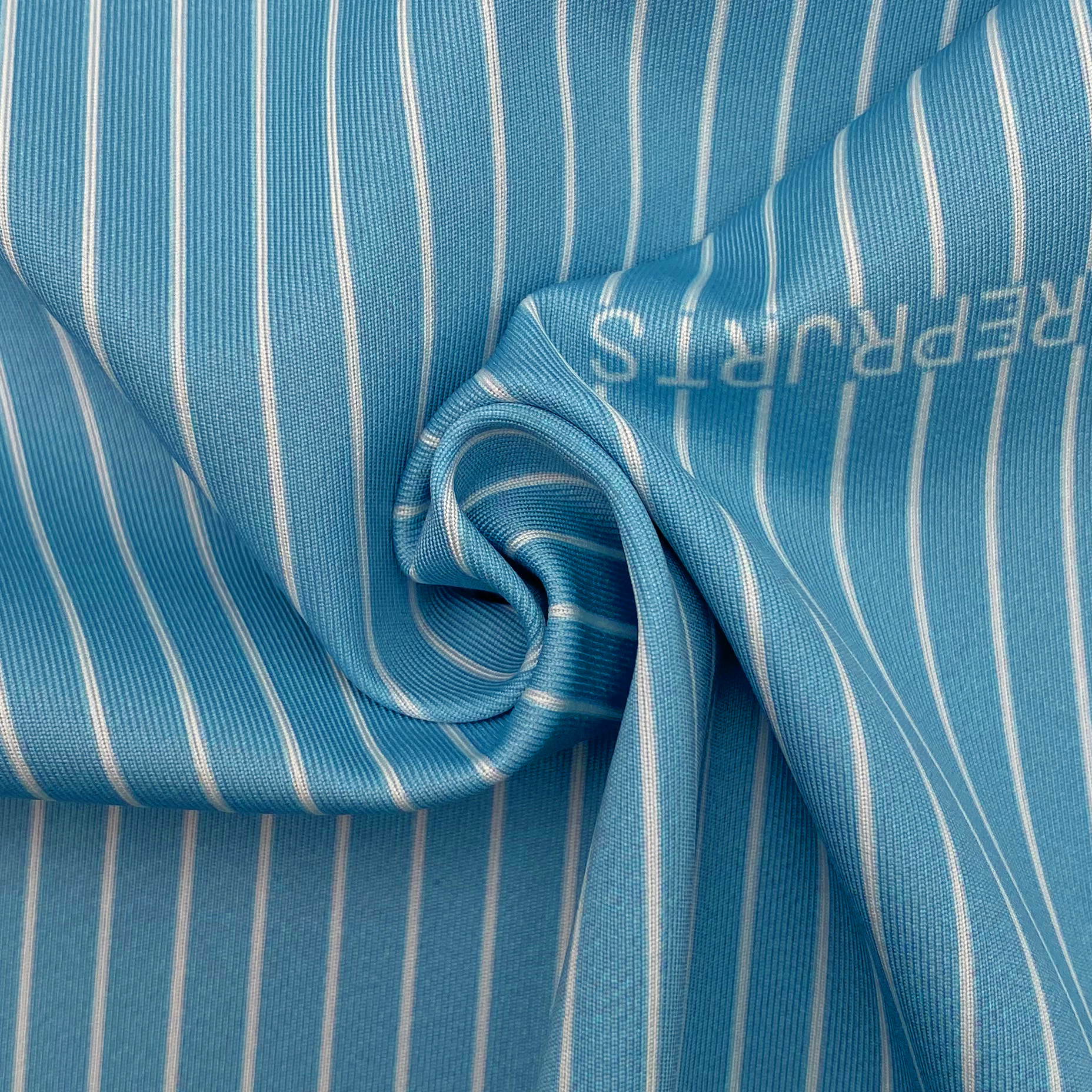 BLUE AT WHITE STRIPED INTERLOCK FABRIC